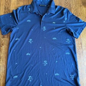 Travis Matthew navy golf polo shirt.
